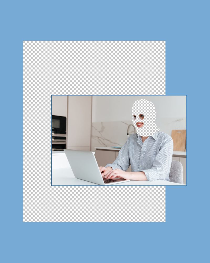 Eine Person, die am Laptop sitzt. Über ihr Gesicht ist eine Maske gemalt.